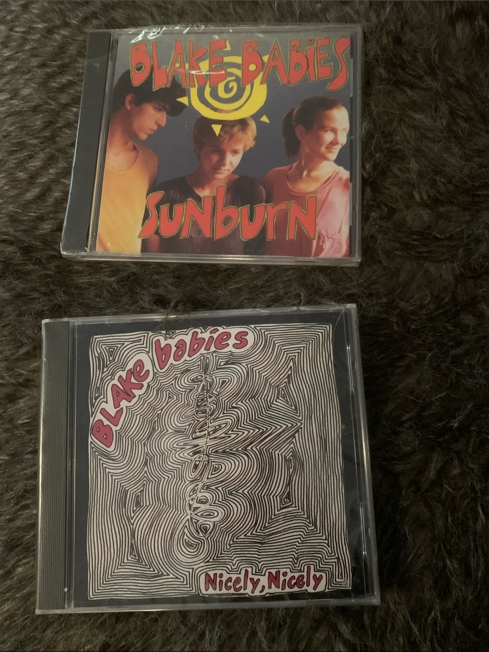- Sunburn / Nicely, Nicely CD Bundle (Pink, Yellow, Black)